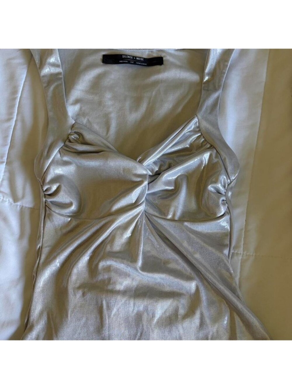 Urban Outfitters silver metallic top with bow detail Size S.